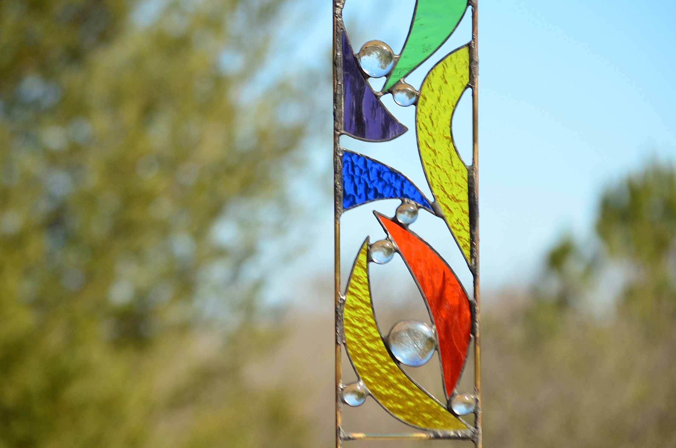 stained glass garden ornaments by Windsong Glass Studio
