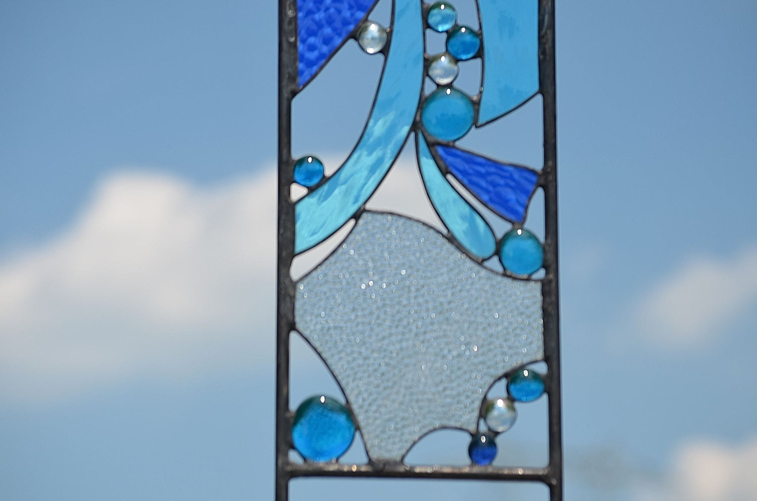 Windsong Glass Studio stained glass yard sculptures