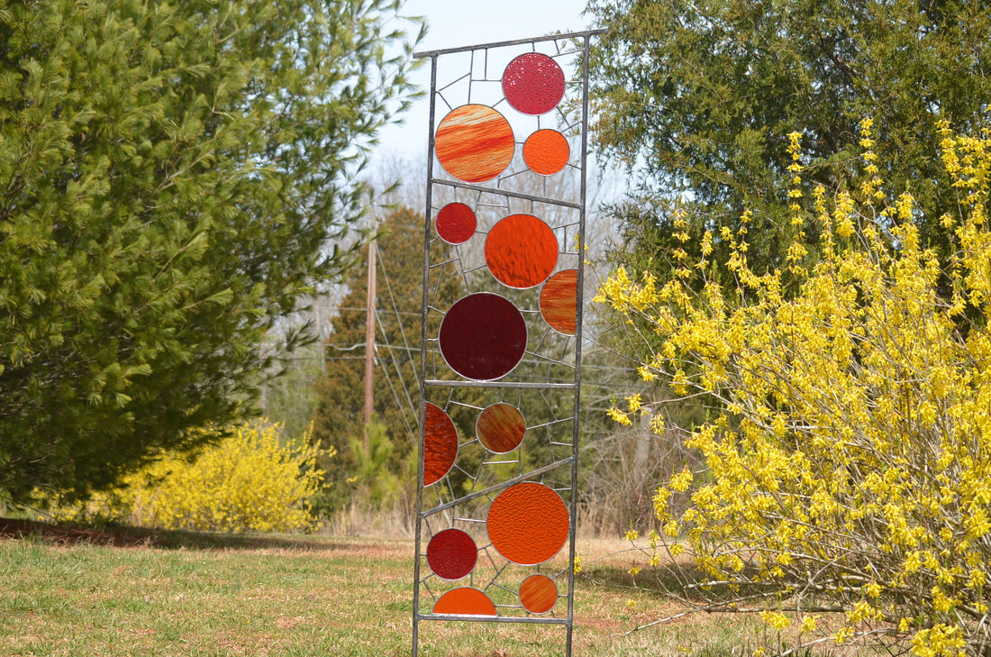 metal and glass garden sculptures