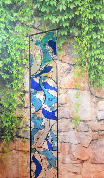 large stained glass yard art by Windsong Glass Studio