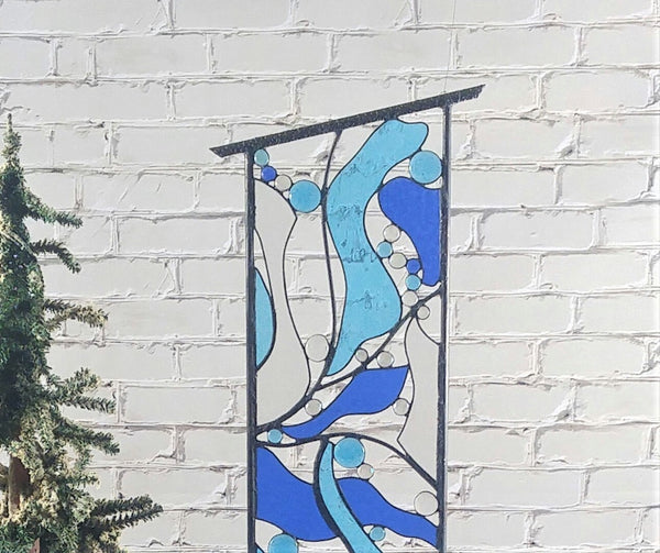 outdoor stained glass art by Windsong Glass Studio